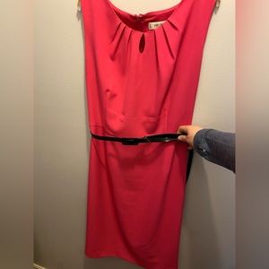 Beautiful Barbie pink sleeveless dress with black patent belt.